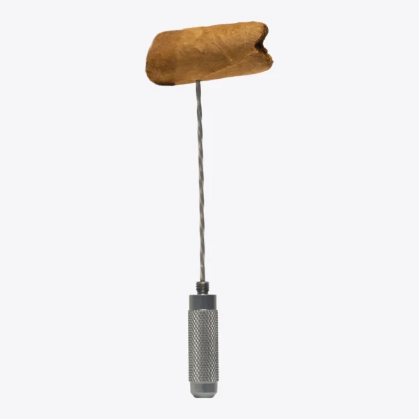 Lotus Cigar Poker in chrome holding a cigar nub