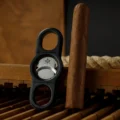 Les Fines Lames La Guillotine Rotor cutter beside a cigar