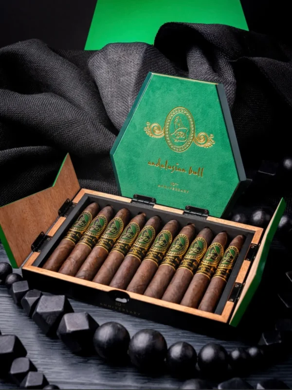 Open box of 10 Andalusian Bull 10th Anniversary Maduro cigars with the green lid raised