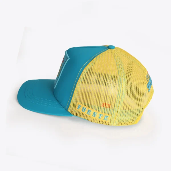Opus X Society Trucker Hat Teal and Yellow Limited Edition 2 Opus X Society teal and yellow trucker hat, side view with Fuente embroidered on the yellow mesh