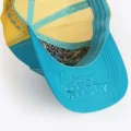 Underside of the teal brim with Opus X Society in tone on tone teal and the printed lining